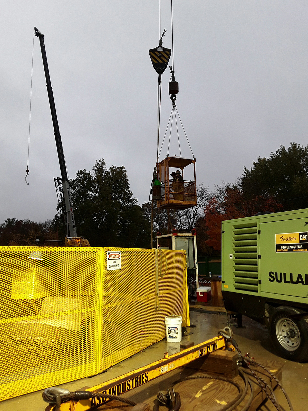  2019 10 31 RS Stiffler and Tuwah being lowered into the shaft to install a larger pump at 833